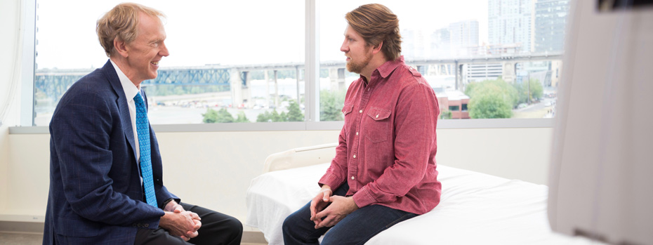Dr. John Hunter enjoys talking with patients