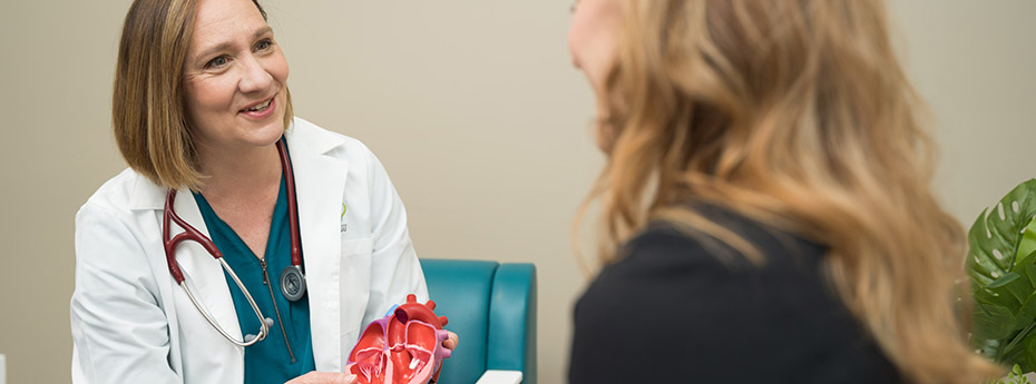 Pediatric cardiologist Kathryn Holmes with a parent