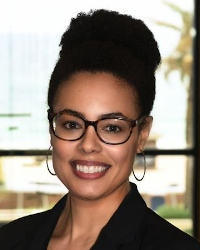 A professional photo of Raina Croff.