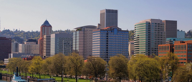 Downtown Portland skyline with trees in the foreground