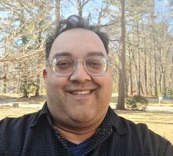 Headshot of Rumel Mahmood.