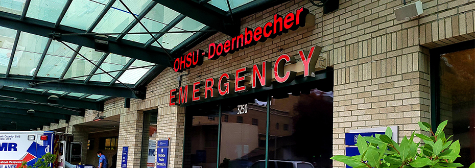 An ambulance sits outside the doors to the OHSU and Doernbecher emergency room.