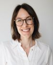Image of smiling female wearing glasses