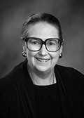 A professional photo of Betsy Johnson.