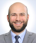 A professional photo of Chris Abruzzese.