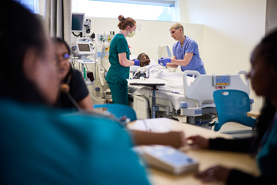 Students practice patient care skills at OHSU's simulation center.