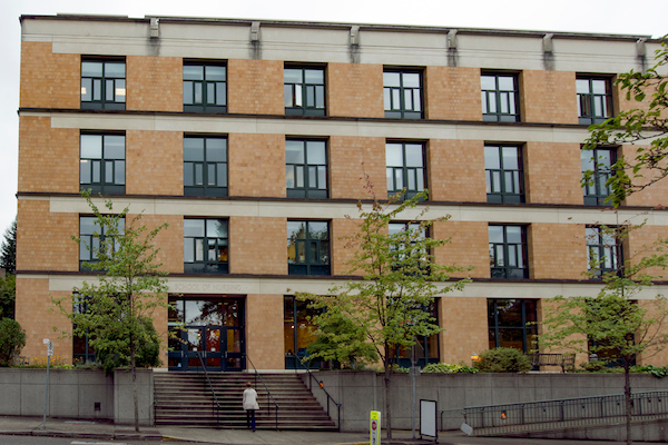 Square building with windows and a staircase